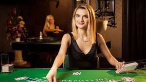 Multiple live dealer tables showing roulette wheel, baccarat cards, and blackjack gameplay on 88xbajee